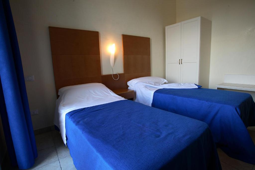 Hotel Resort Portoselvaggio Sant Isidoro  Oda fotoğraf